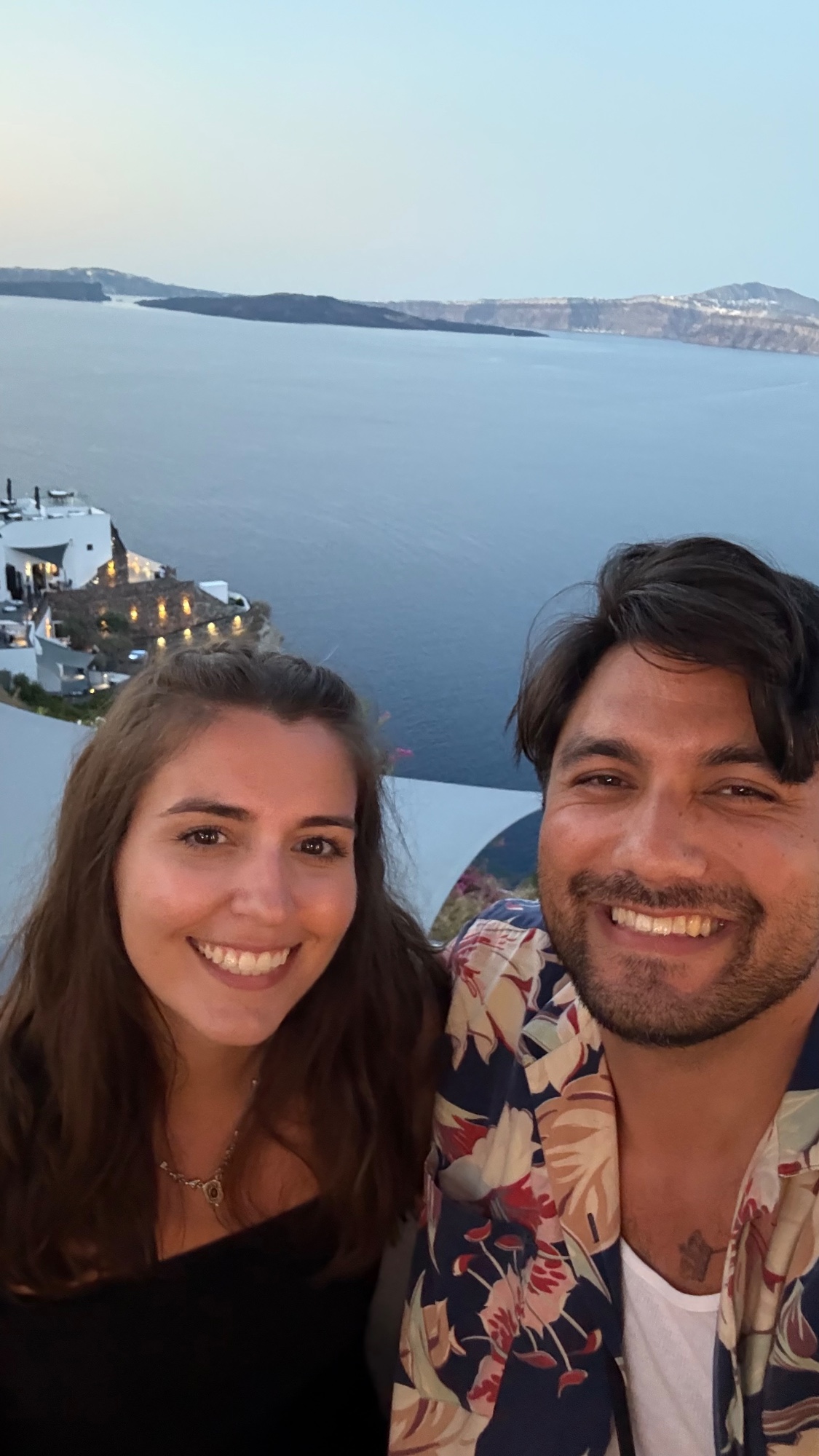 Kyle and Elise at sunset over the caldera in Santorini
